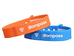 orange and blue compass wristbands next to each other